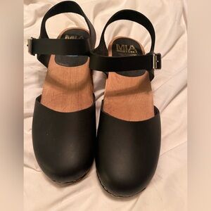 MIA Black Leather Clogs